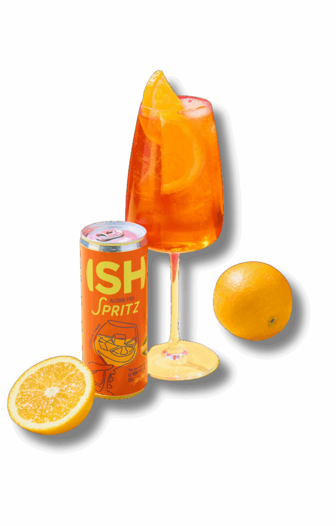 Bezalkoholowy koktajl ISH Spritz w kieliszku z plastrem pomarańczy – alternatywa premium dla klasycznego drinka.